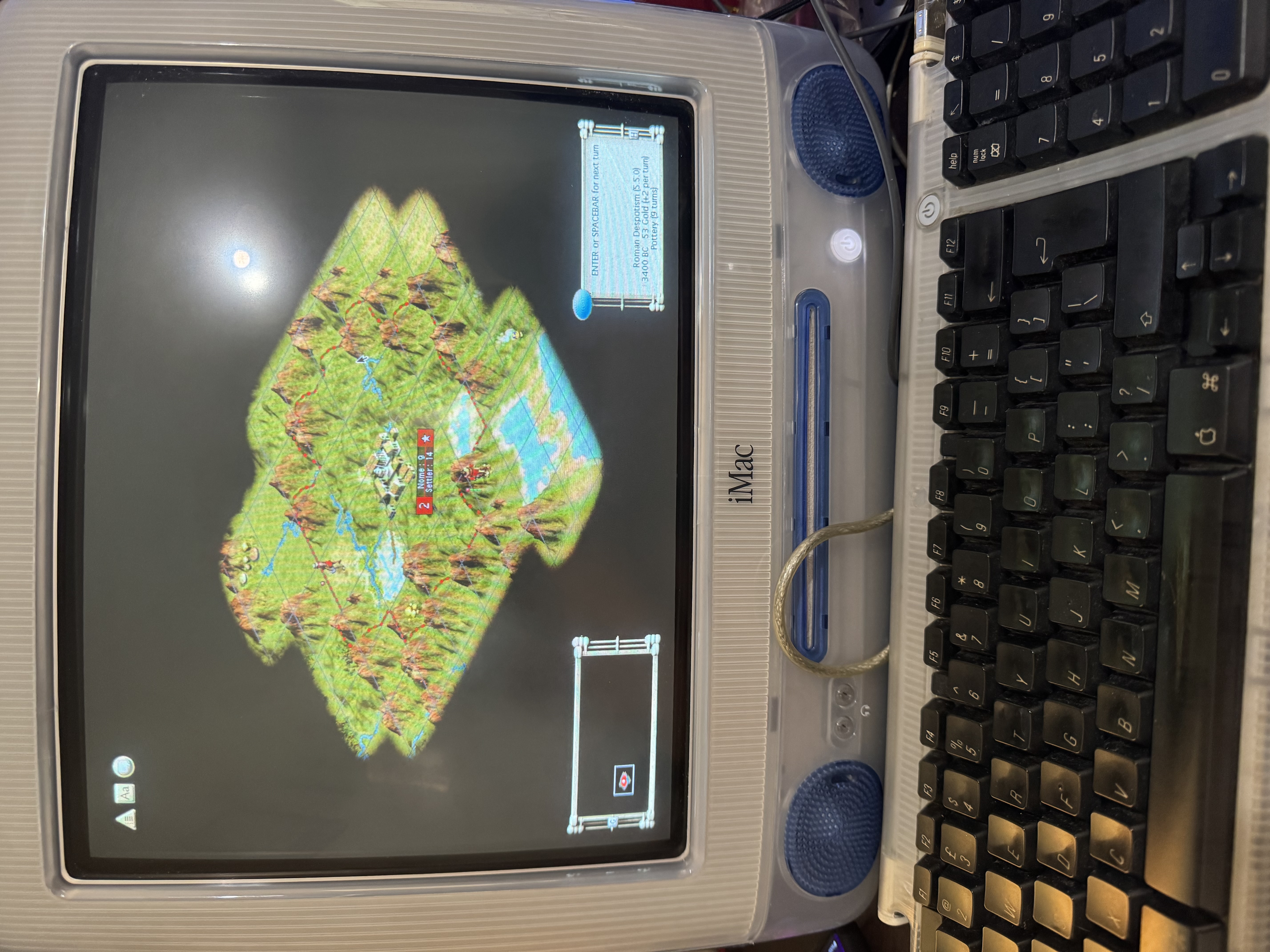iMac G3 running Civilization III. One more turn, on classic Mac OS.